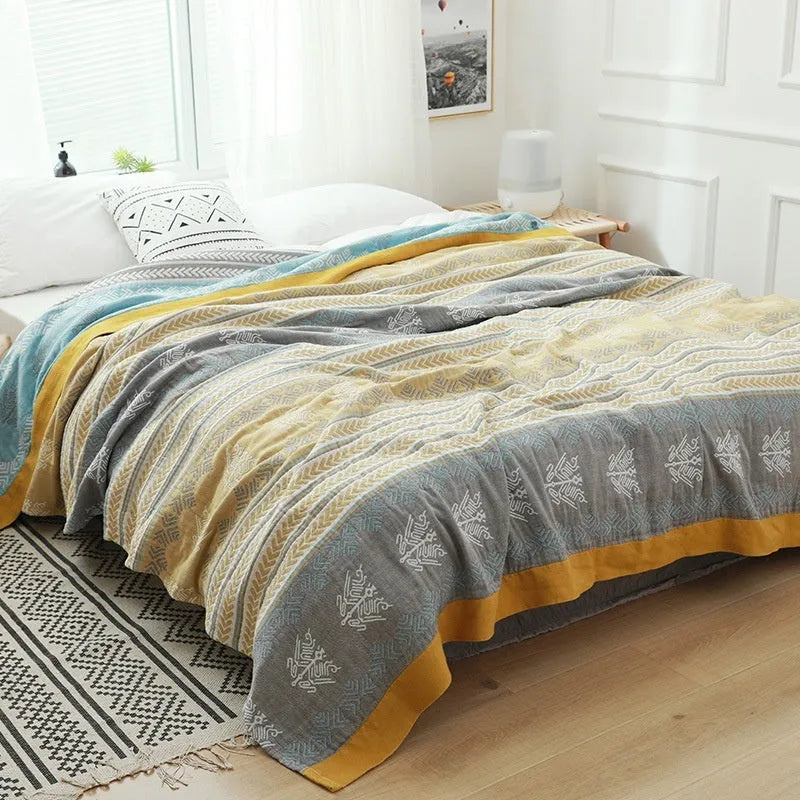Thickened five-layer gauze pure cotton bed blanket in roulette wheel blue pattern.