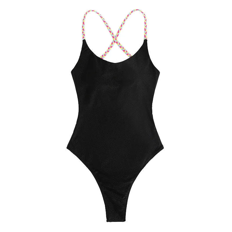 Black one-piece swimsuit for women with backless design and sleeveless cut on mannequin