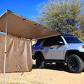 Camping tent sunshade with aluminium poles and camouflage or black glue style, set up outdoors.