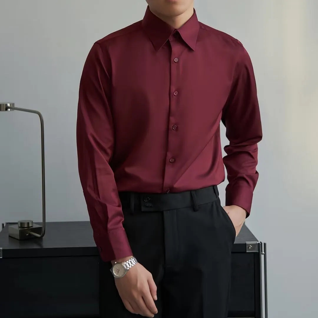 Man wearing a black loose-fit long sleeve cardigan shirt in Korean style.