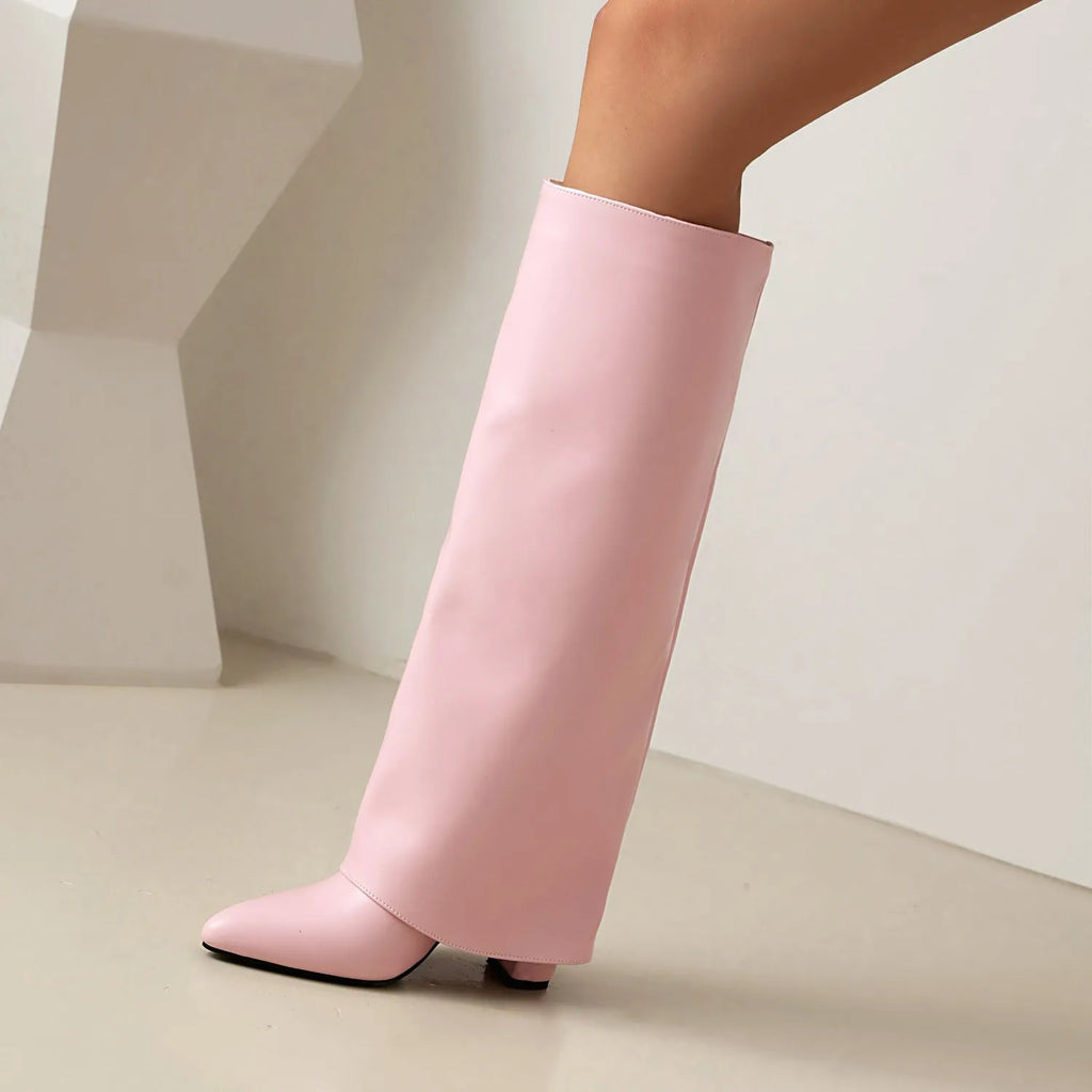 Women's black plus size high-heel winter boots with knee-high shaft and sewn detailing.