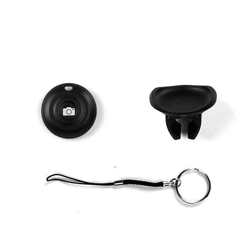 Black Bluetooth remote control selfie shutter with compact button design on PC material casing