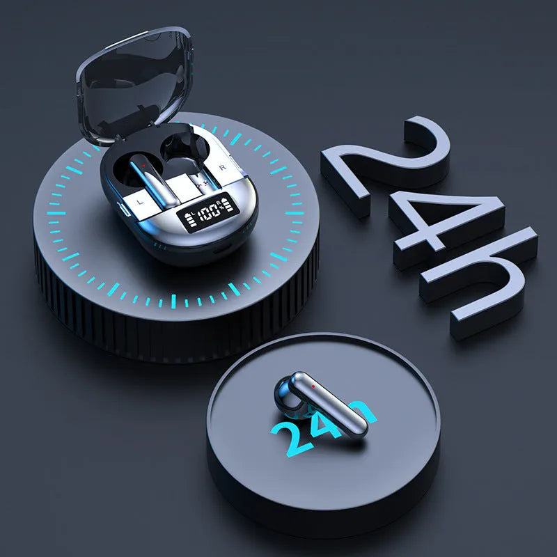Black and white wireless Bluetooth in-ear headphones with a charging bin on a table.