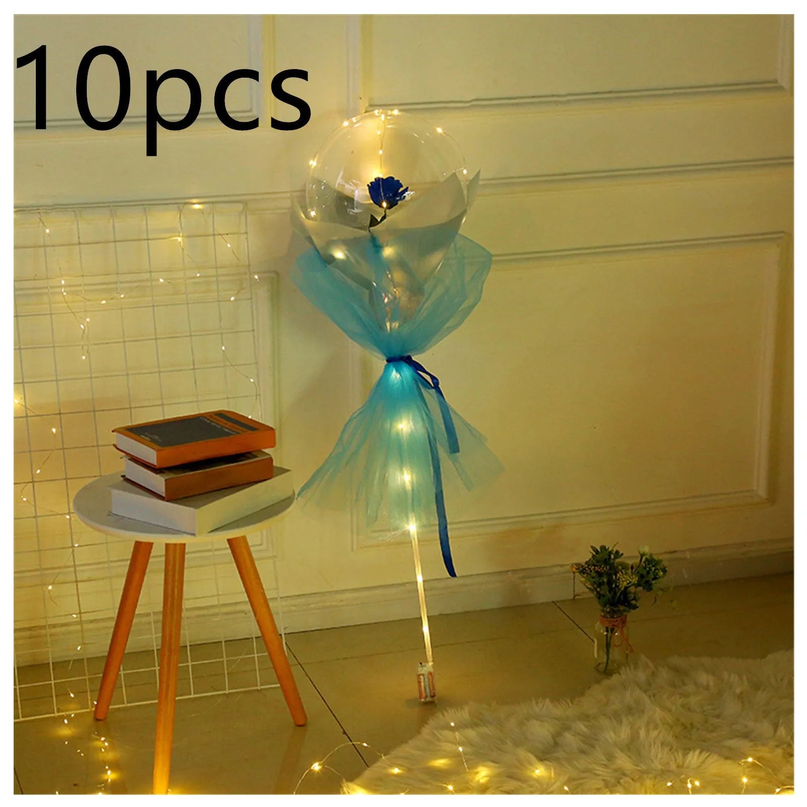 Transparent LED luminous balloon bouquet with artificial rose and glowing light inside, displayed as a DIY kit.