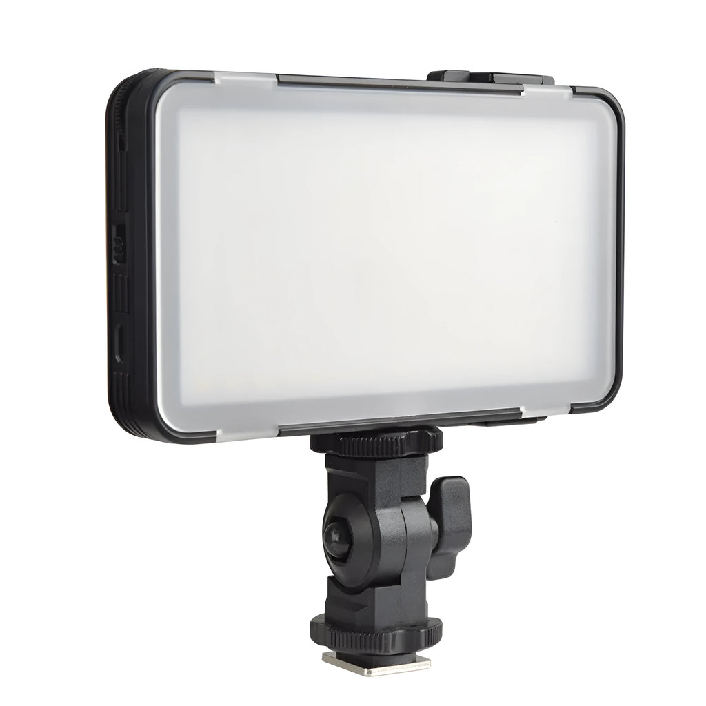 Shenniu M150 ultra-thin silver LED video light mounted on a mobile phone with adjustable brightness.