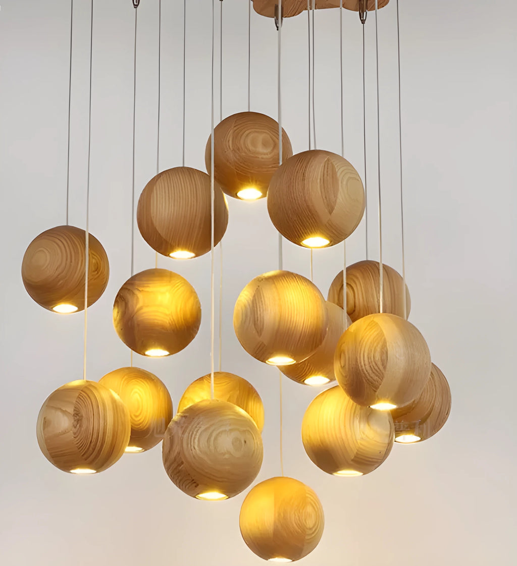 Nordic-style wooden ball chandelier with adjustable cord, shown in single-head and three-head styles on a wood disc base.