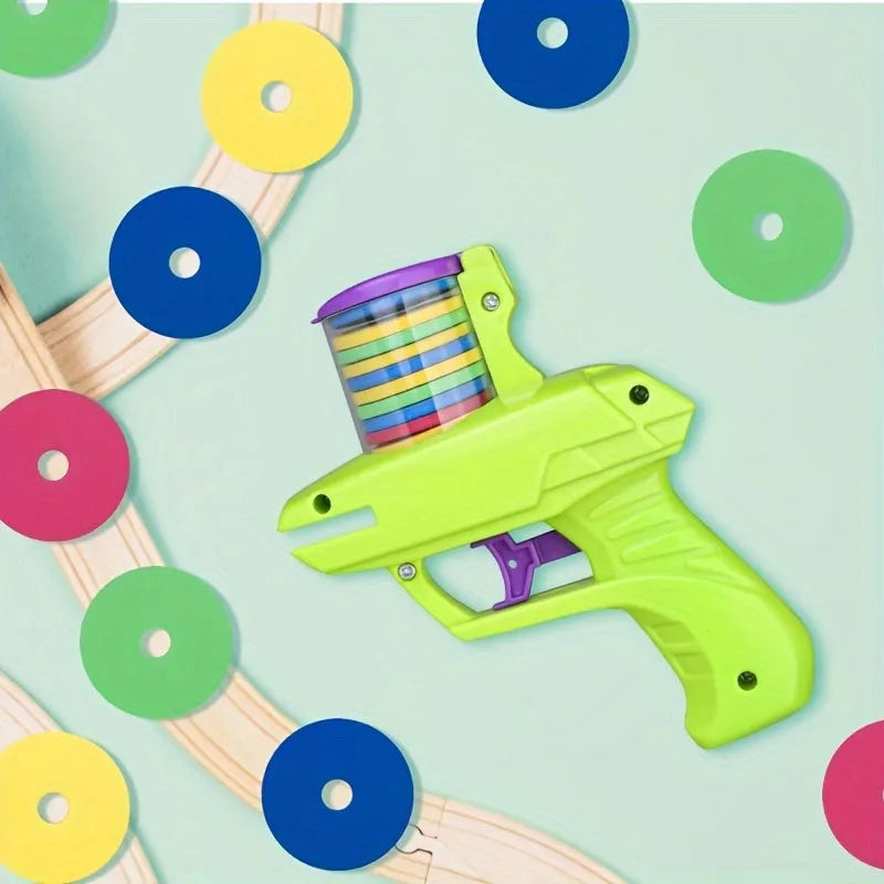 Green battery-free cat toy launcher with foam discs for interactive indoor play