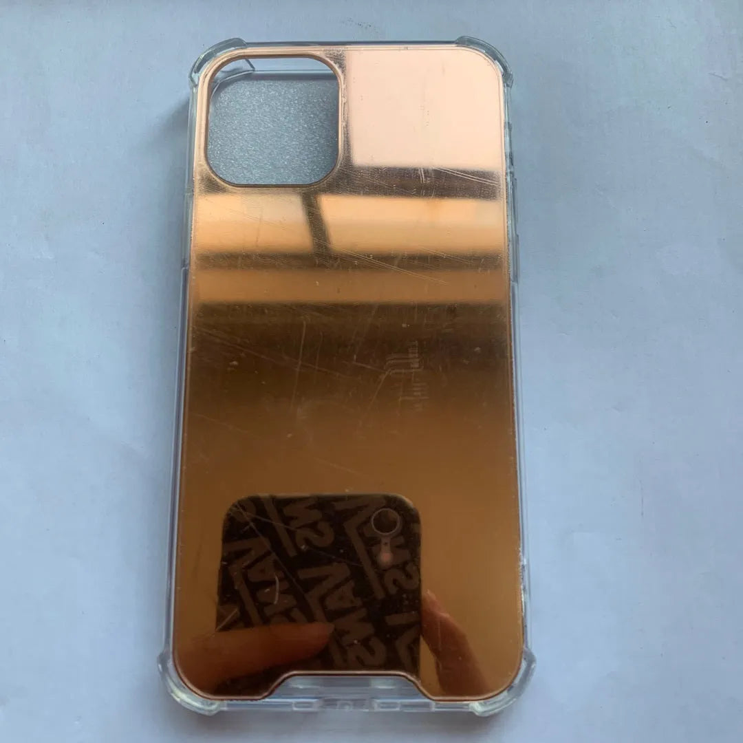 Mirror finish protective TPU case for iPhone shown in various colours.