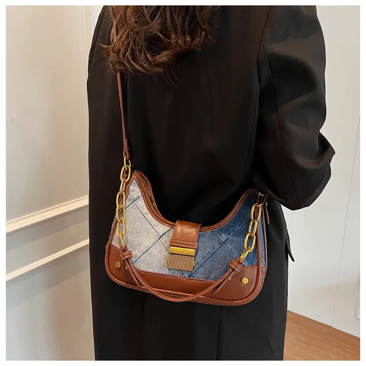 Brown soft denim women's bucket shoulder bag with diamond mesh panels and chain strap