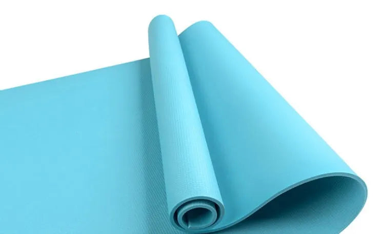 Super soft EVA yoga mat in blue showing texture and thickness