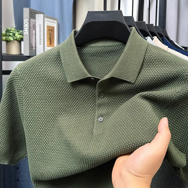 Loose fitting short sleeve cotton sweater in a neutral colour, showing pullover style and casual fit.