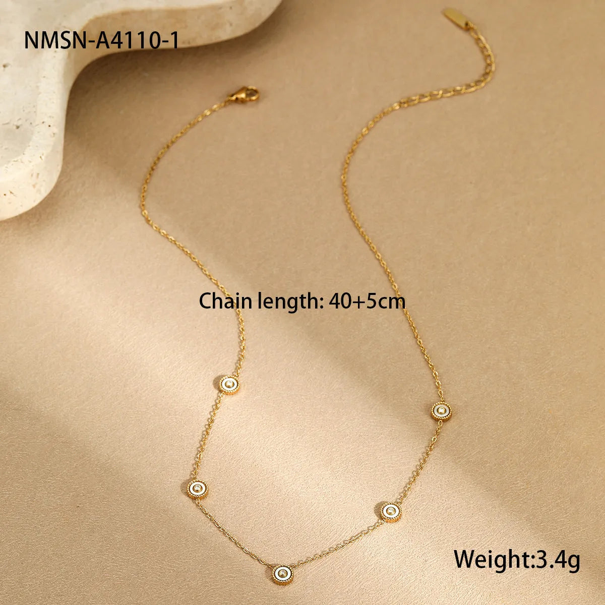 Geometric fritillary design stainless steel bracelet with 18K gold plating and matching necklace