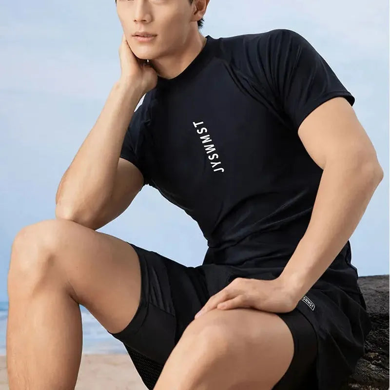 Men's plus size swimming set featuring a rash guard top and matching swim shorts on a grey background.