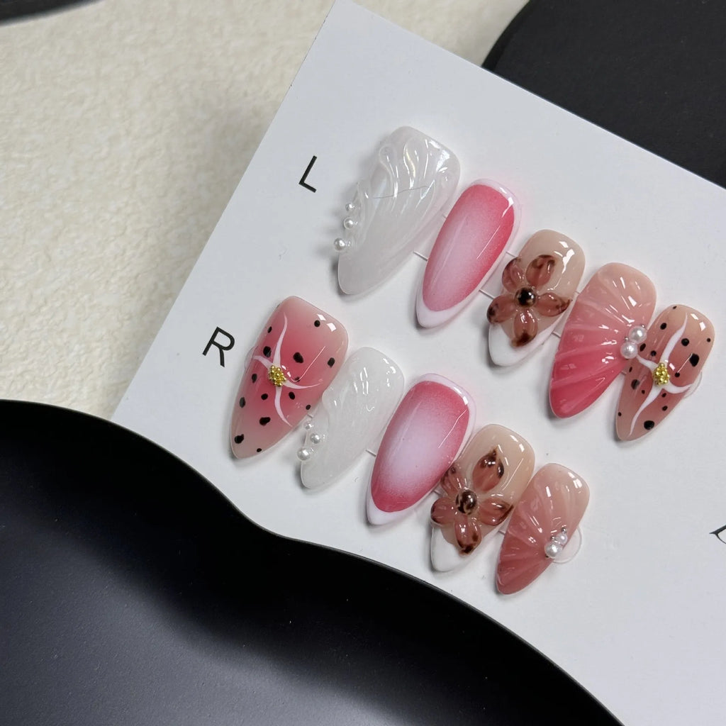 Set of hand-painted 3D carved nail beauty patches in embossed cute patterns.