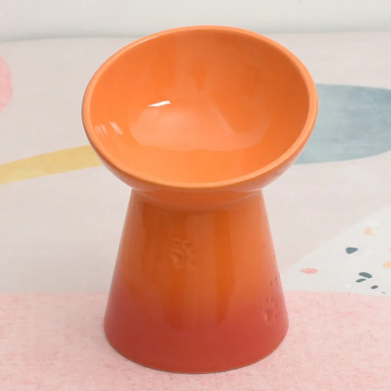 Ceramic pet bowl with anti-tumble design and raised chin support for cats and dogs