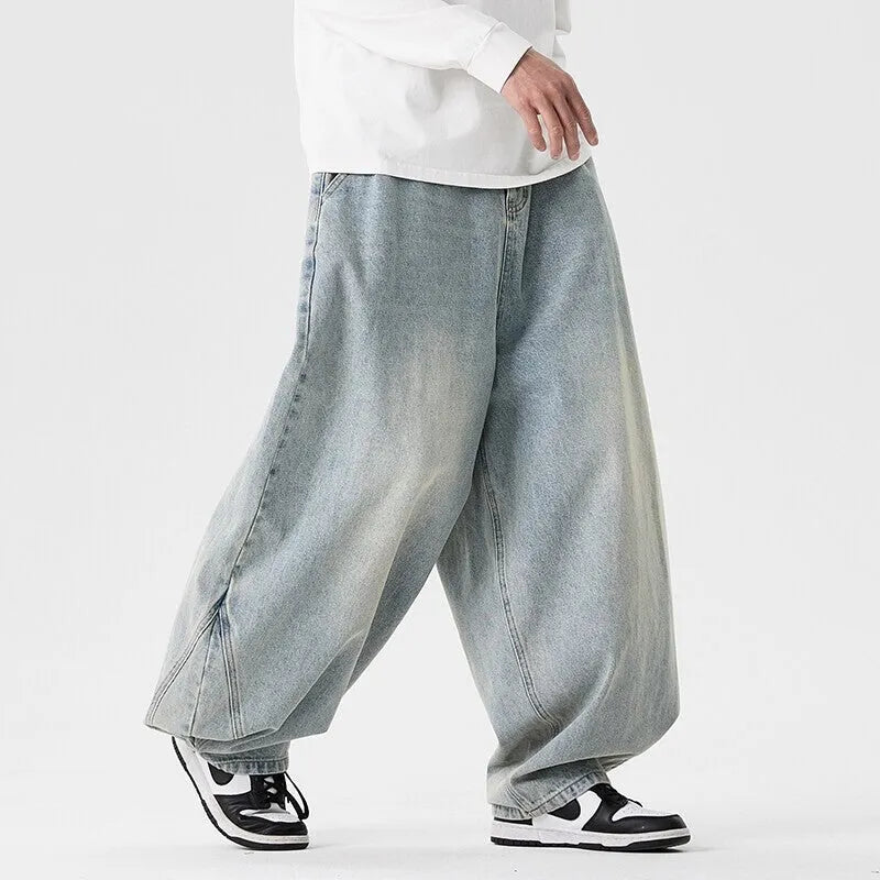 Men's plus size wide leg baggy jeans in black denim with straight leg openings