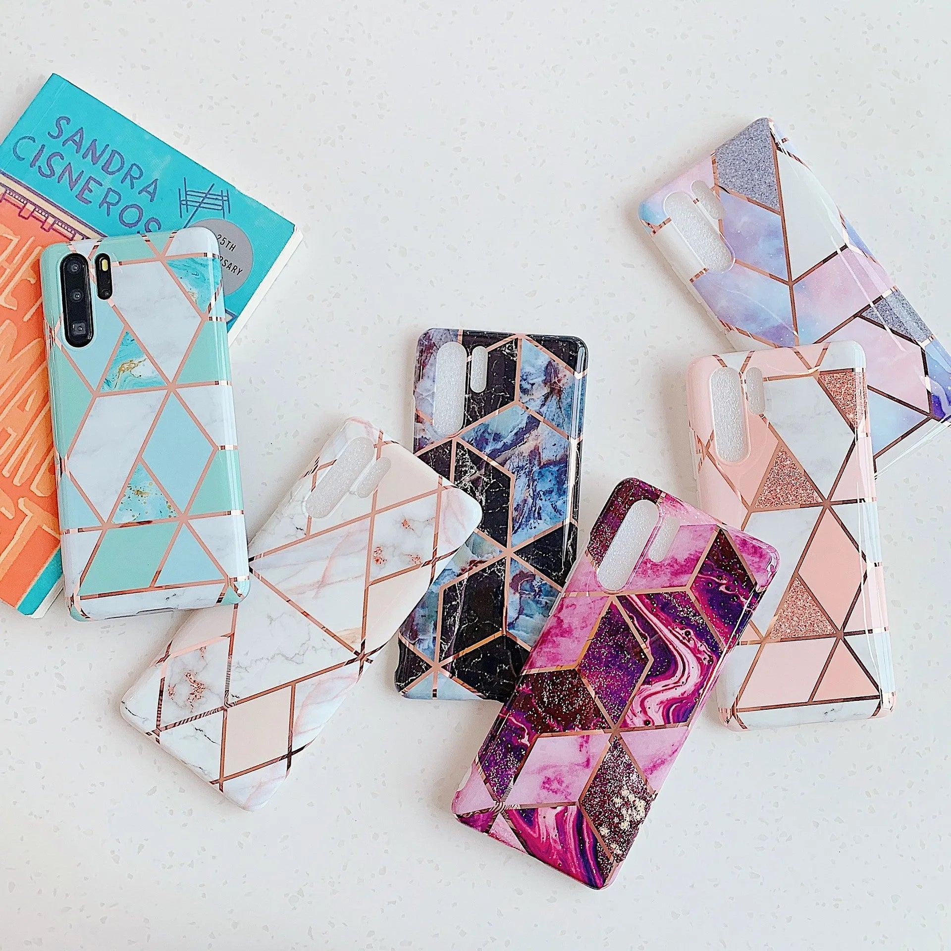 Electroplated marble pattern mobile phone case for Huawei and Samsung smartphones in various colours.
