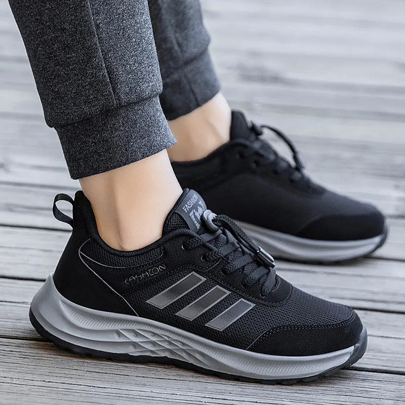 Men's and women's breathable mesh casual shoes with elastic band and non-slip sole in multiple colours.