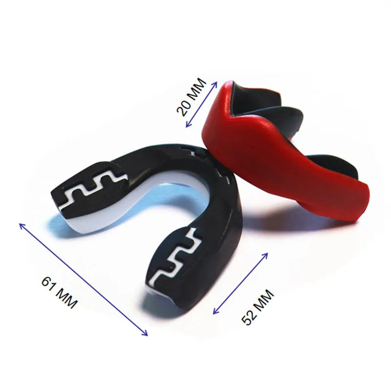 Adult boxing mouthguard with printed teeth design in black and white, for martial arts protection.