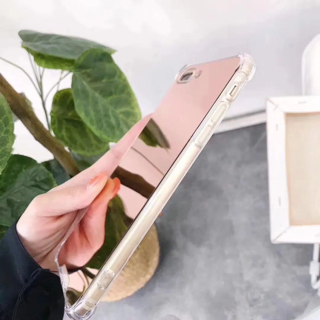 Mirror finish protective TPU case for iPhone shown in various colours.