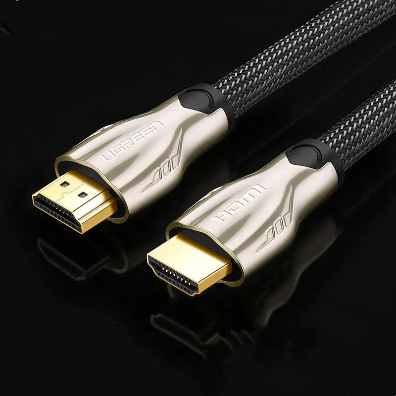 Black 5 metre long HDMI cable with gold-plated connectors on a white background.
