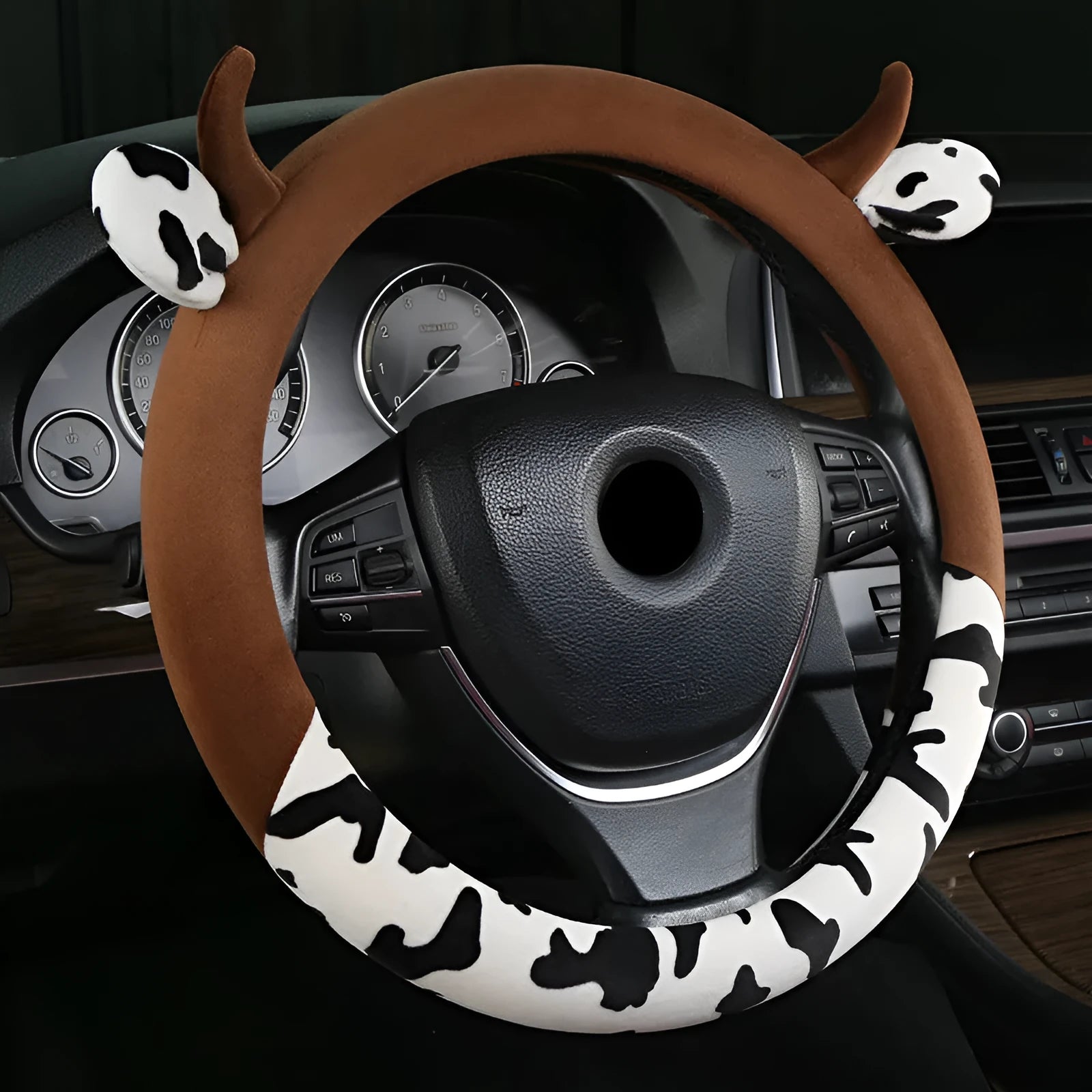 Short plush car steering wheel cover in black, showing soft texture and fitted design.