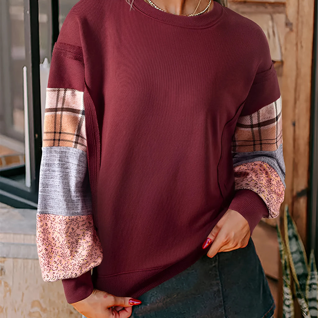Women's beige and red plaid stitching long-sleeved loose fit casual pullover top.