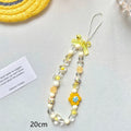 Beaded flower mobile phone lanyard in blue, pink, and yellow colour options