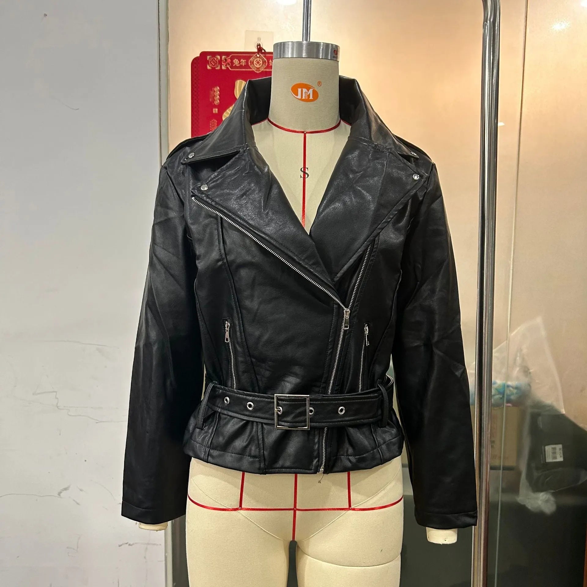 Women's punk short belt lapel jacket in polyester leather with drawstring waist and Peter Pan collar