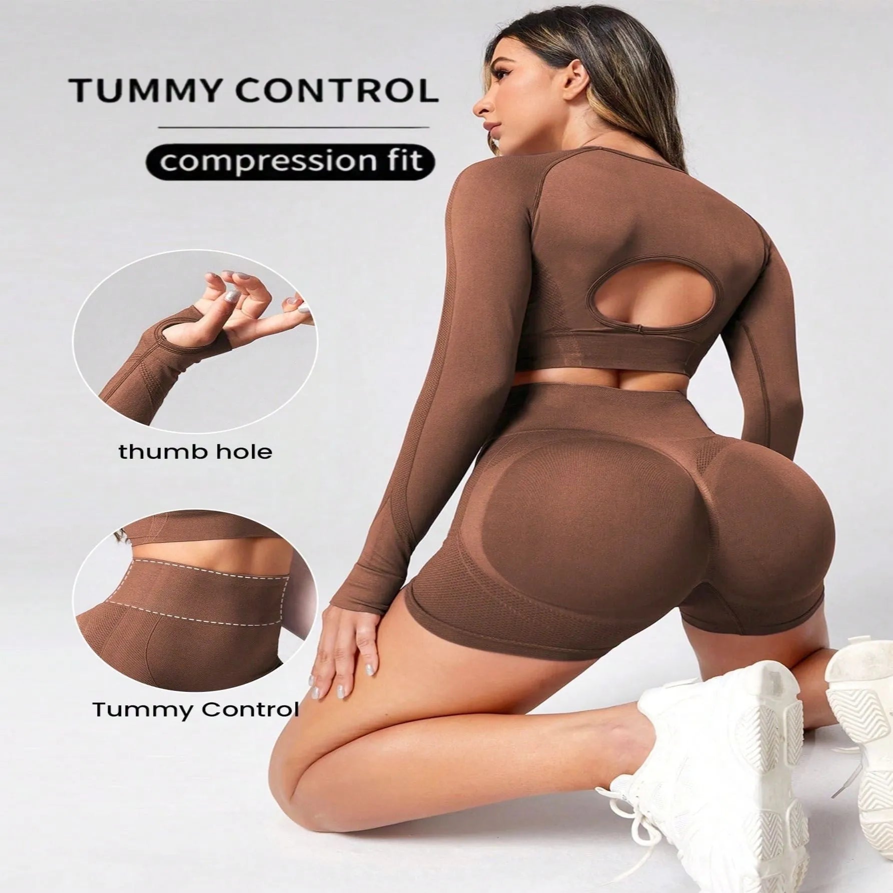 Women's black high waist yoga suit with long sleeve top and tight-fitting trousers on a mannequin.