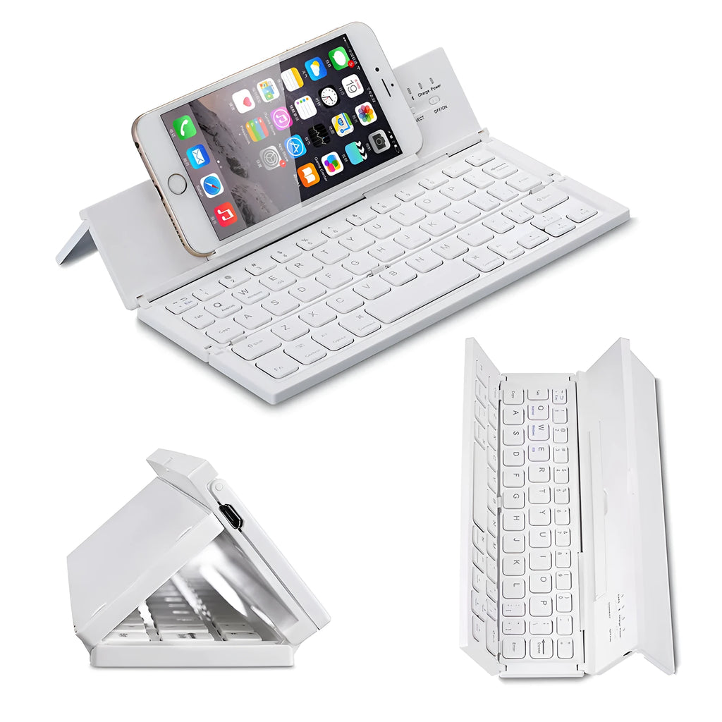 Black folding wireless Bluetooth keyboard unfolded next to tablet showing mini keyboard size