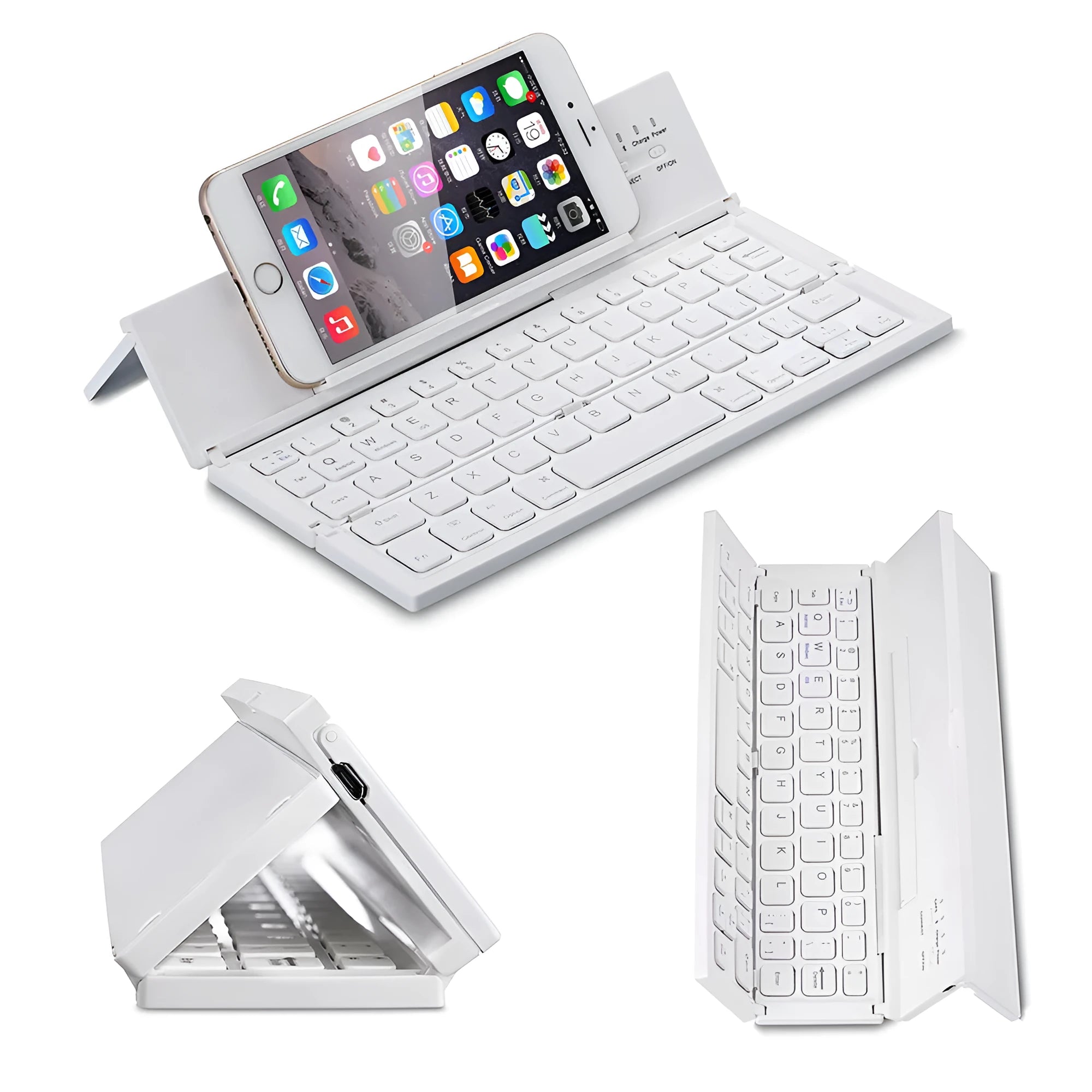 Black folding wireless Bluetooth keyboard unfolded next to tablet showing mini keyboard size