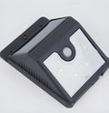 Solar-powered outdoor LED sensor light with four adjustable light heads for garden security