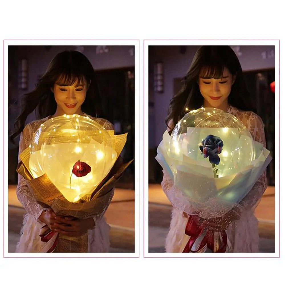 Transparent LED luminous balloon bouquet with artificial rose and glowing light inside, displayed as a DIY kit.