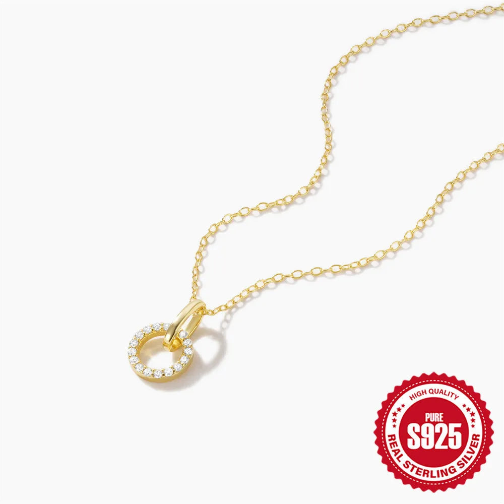 Gold colour sterling silver clavique chain necklace with interlocking zircon design on model