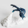 3D printed dragon-shaped night light with glowing red breathing LED effect on a table