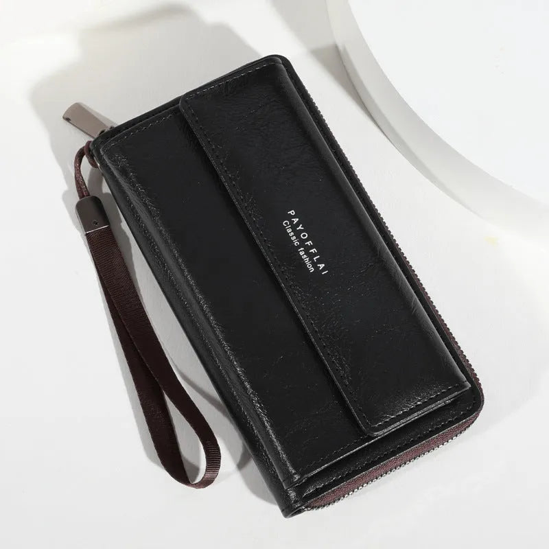 Long men's bifold wallet in PU leather showing multiple card slots and compartments.