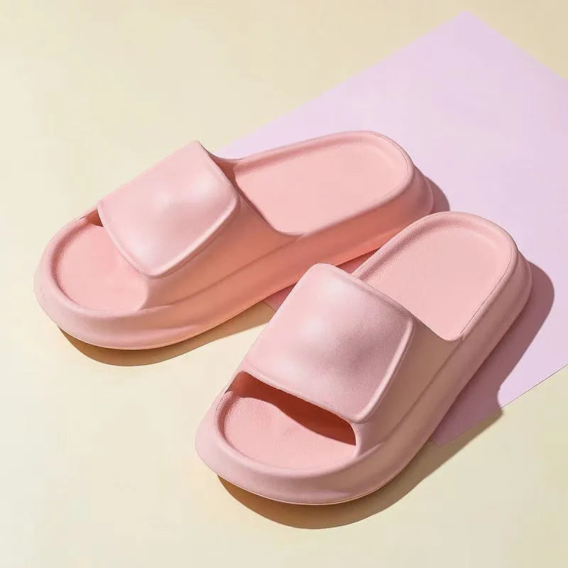 Thick sole EVA flip flop slippers in multiple colours on a white background.