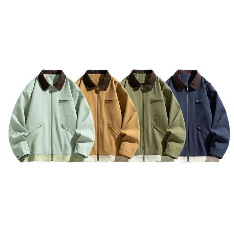 Man wearing a mint green loose-fit retro workwear jacket with contrast lapels and side pockets.