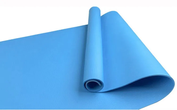 Super soft EVA yoga mat in blue showing texture and thickness