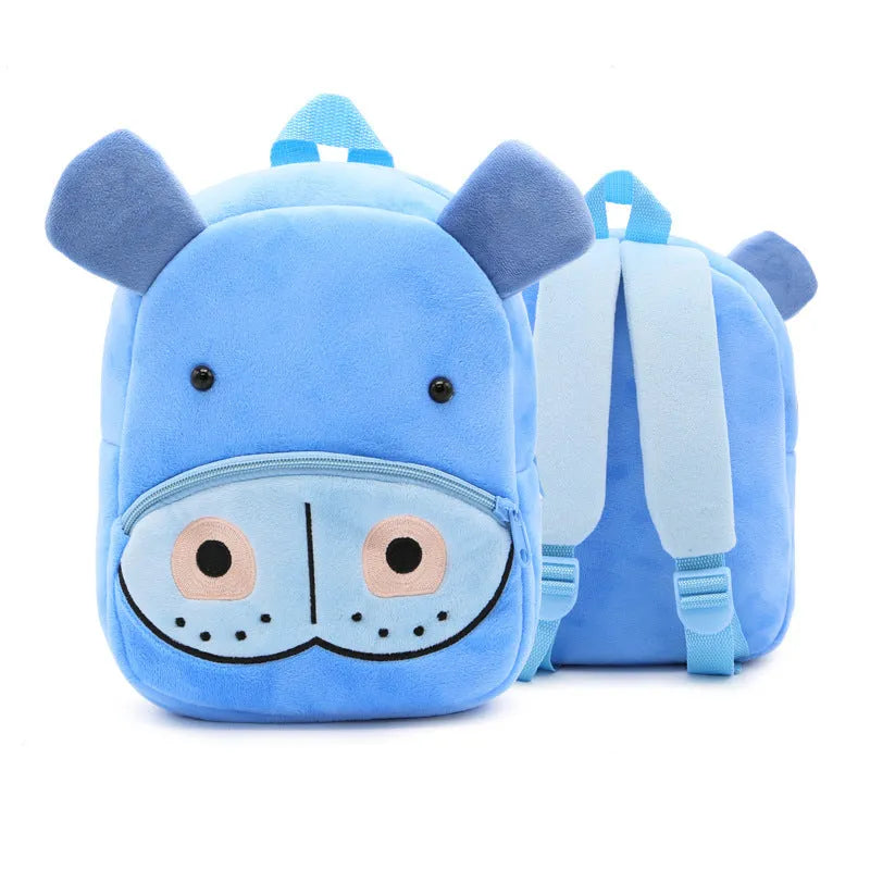 Soft plush children's backpack with cartoon animal design, showing zippered main compartment.