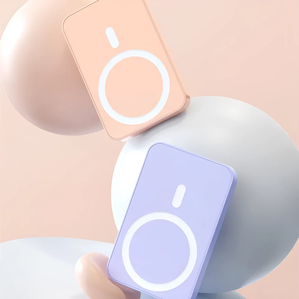 Pink, purple, and white magnetic wireless power bank showing compact 100x64x18mm size
