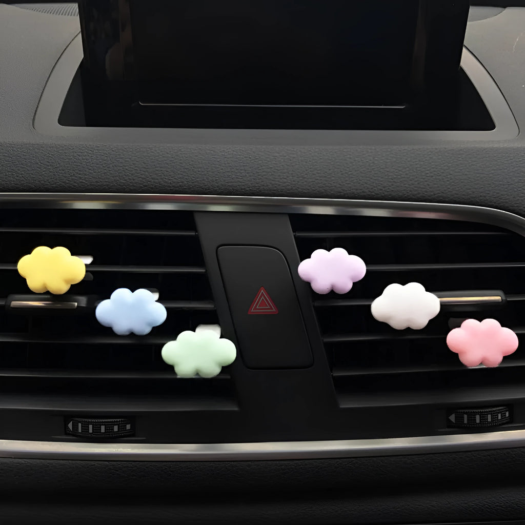 Resin car fragrance clip with Baiyun Cartoon design attached to car air vent