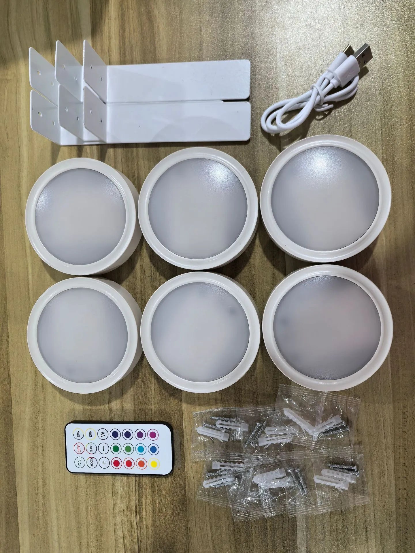 Wireless LED painting lamp with magnetic charging and remote control in black, white or gold finish