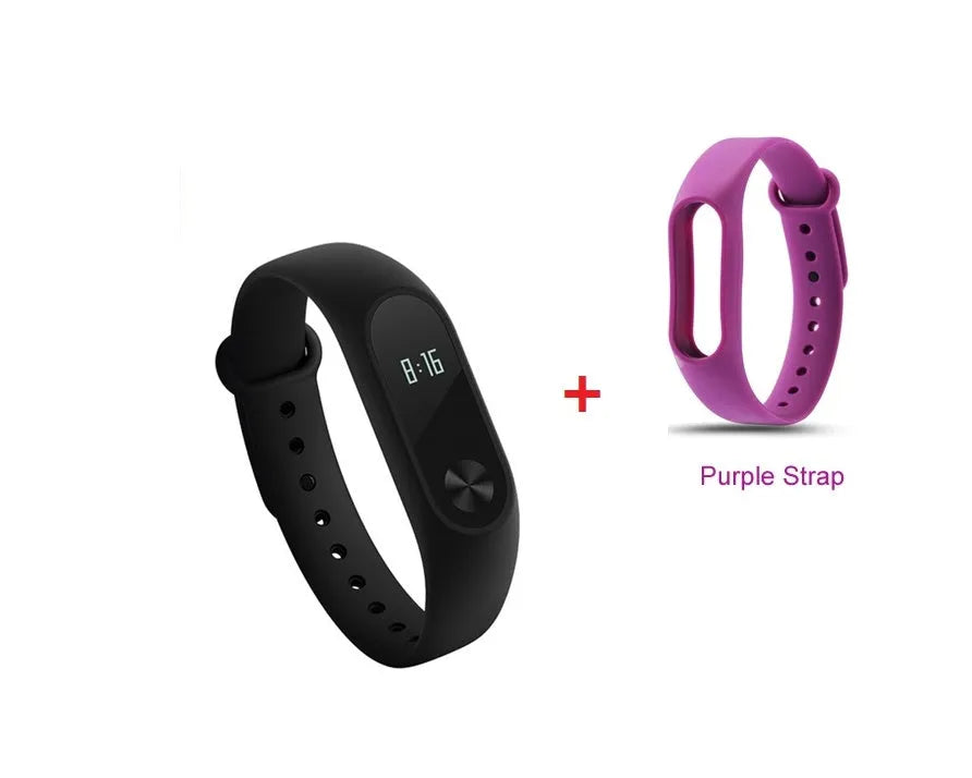 Black Xiaomi Mi Band 2 fitness tracker with OLED screen on a wrist.