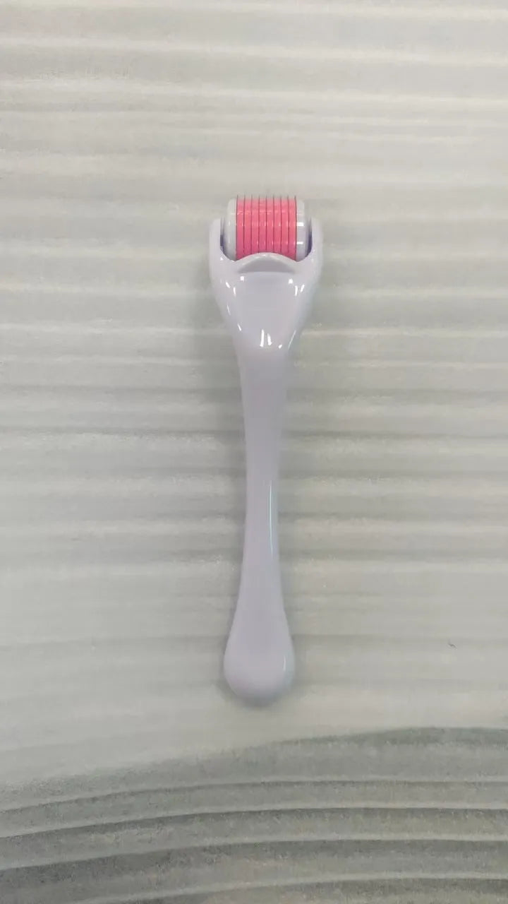 540 micro needle dermaroller roller with black handle and coloured wheel showing needle specification