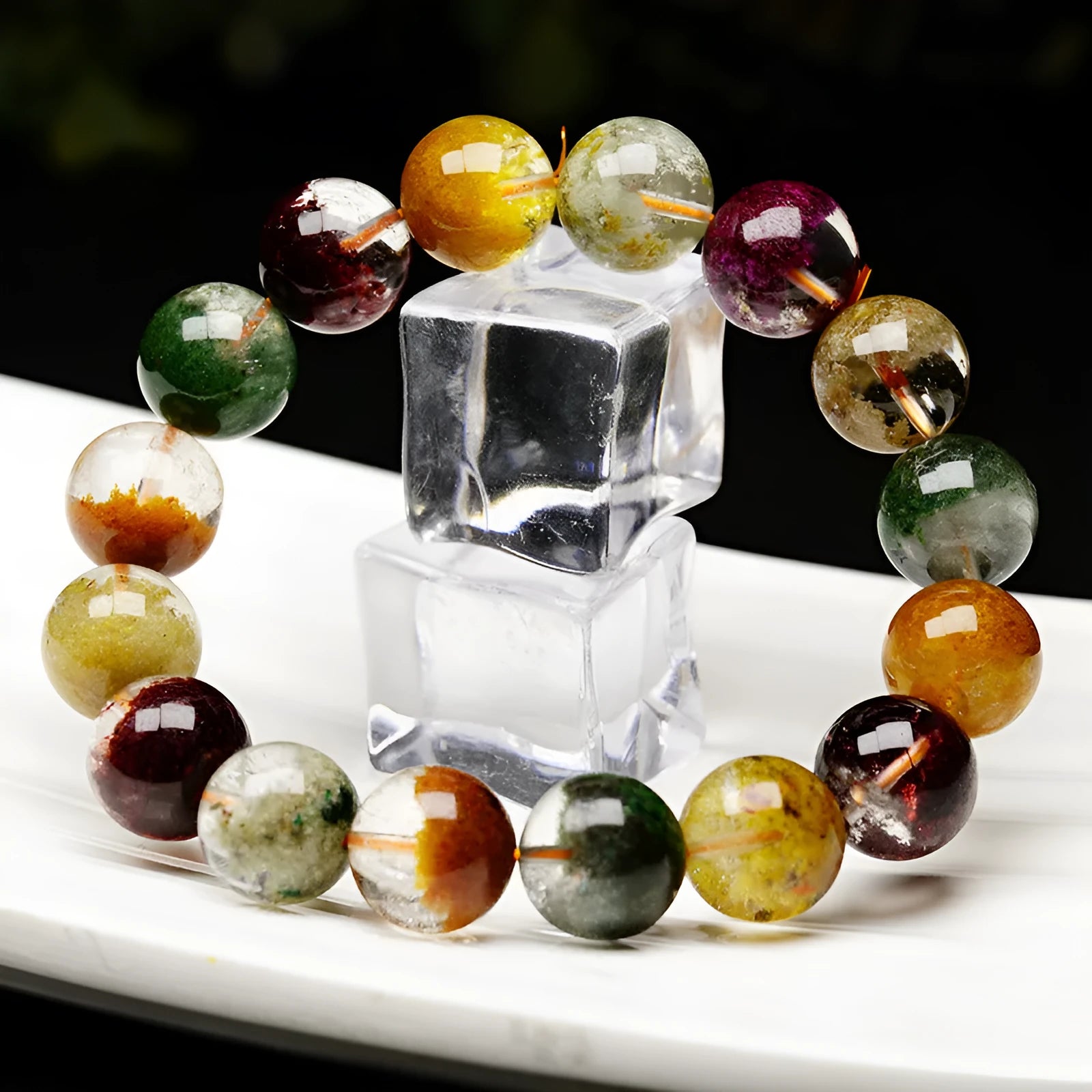 Crystal bracelet with colourful cornucopia design and retro ethnic styling on wrist