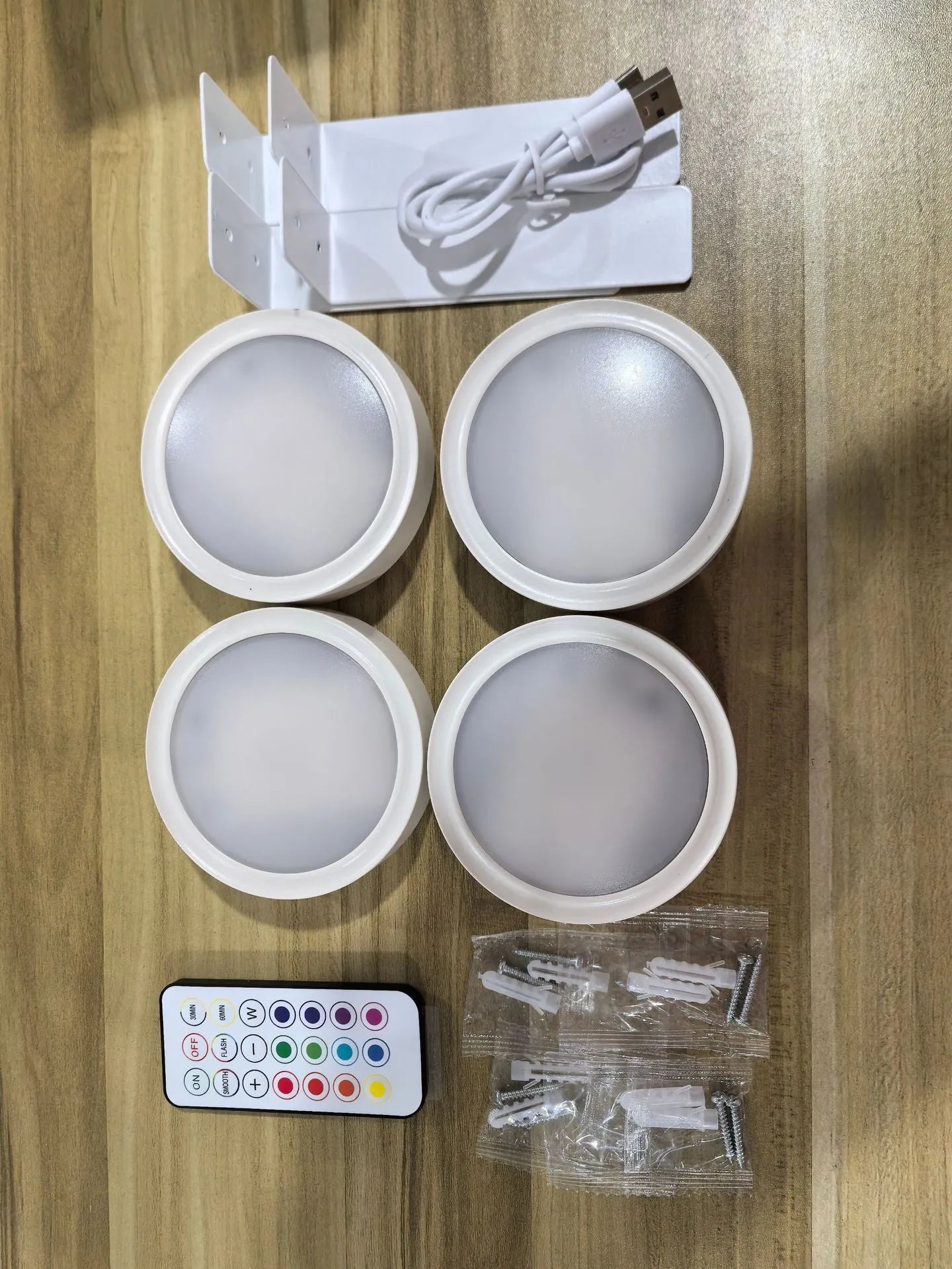 Wireless LED painting lamp with magnetic charging and remote control in black, white or gold finish