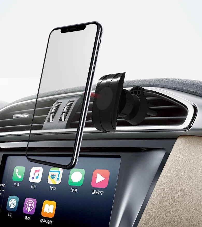 Black universal car phone holder attached to a car air vent.