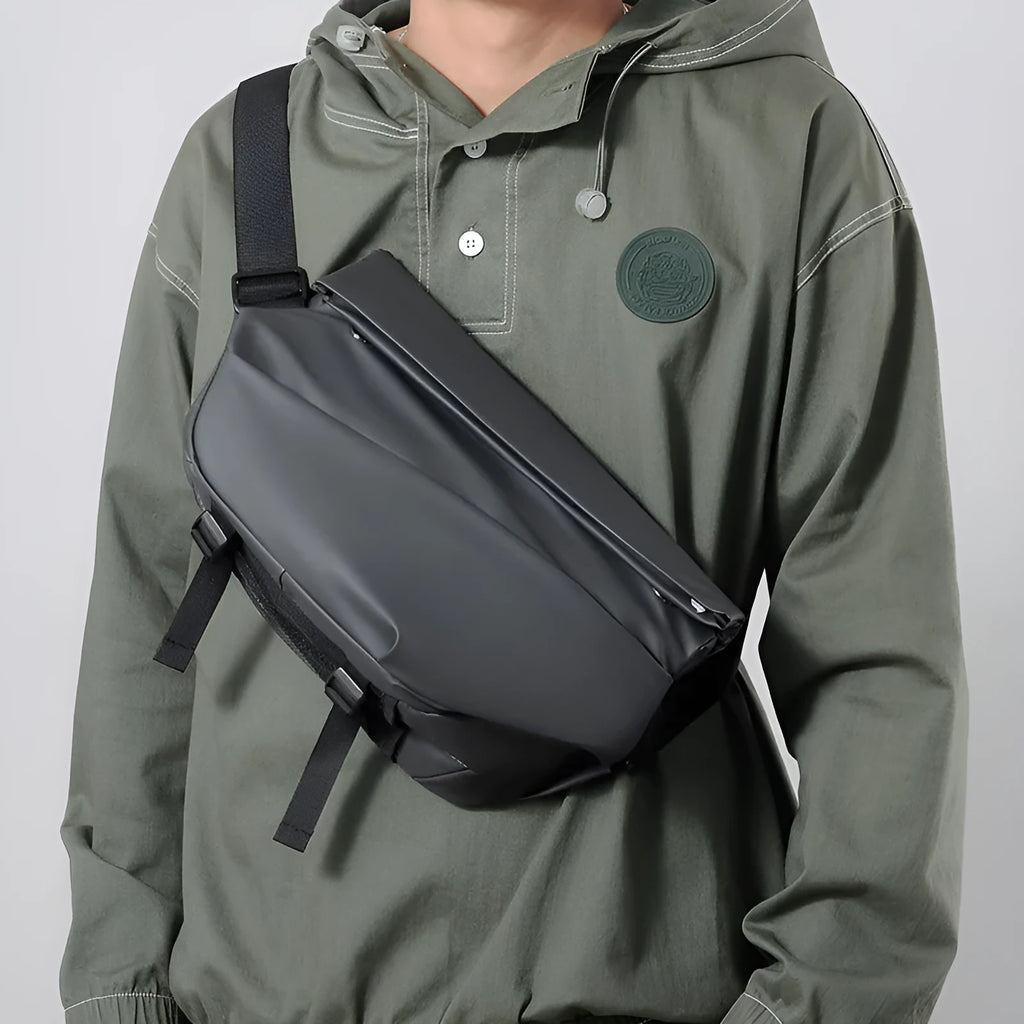 Grey medium square crossbody bag for men showing internal phone and document compartments